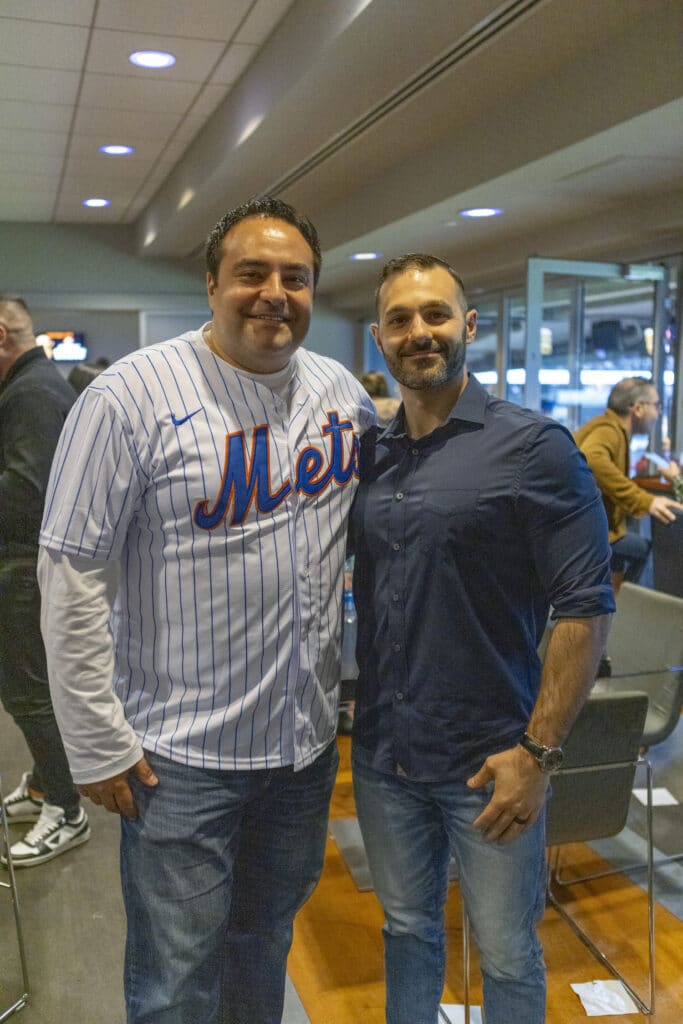 Managing Partner Alex Nocerino and Associate Attorney Pavlo Pavlatos posing together for a picture at New York Mets game
