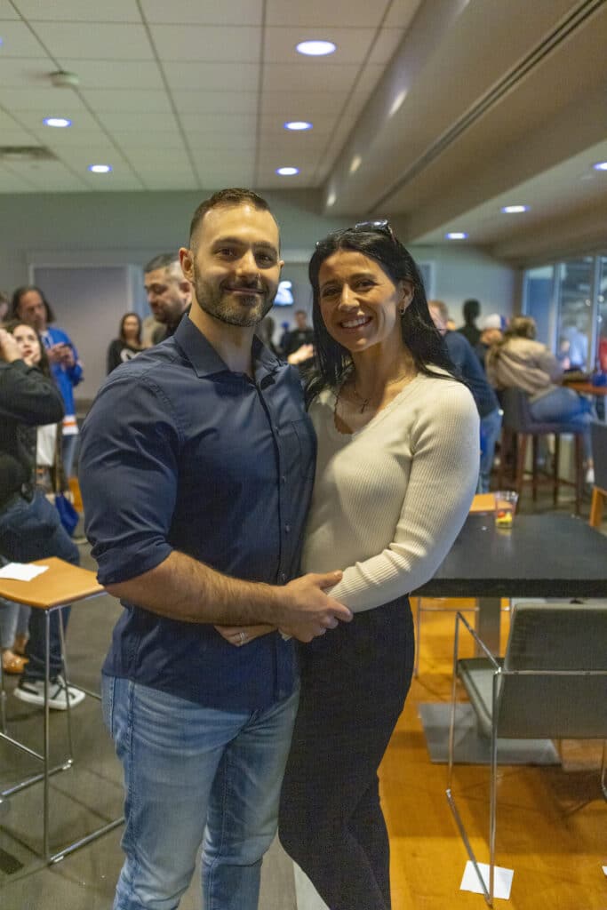 Associate attorney Pavlo Pavlatos and wife at New York Mets box seating where Chopra & Nocerino threw first pitch