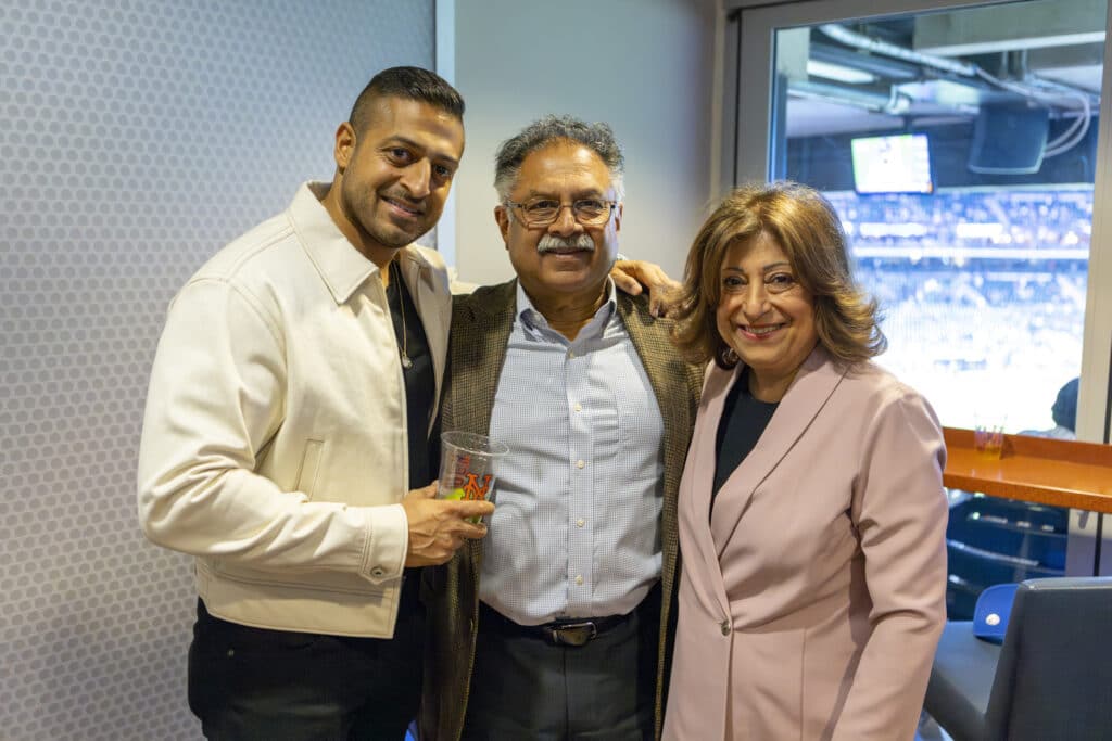 Sameer Chopra and his parents at New York Mets game where Chopra & Nocerino threw the first pitch