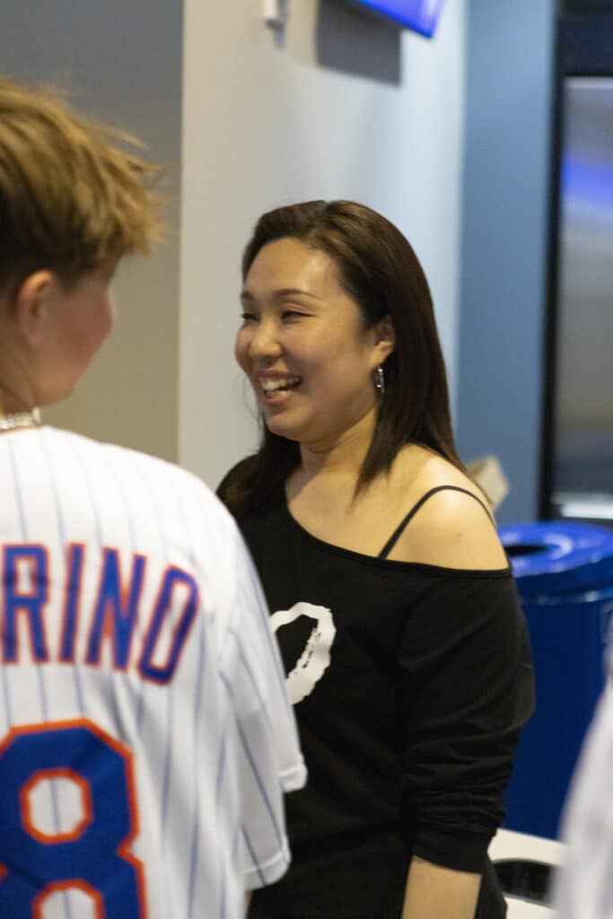 Members of the Chopra & Nocerino team at New York Mets game in box seating lounge