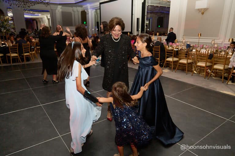 Sameer's daughters dancing at gala