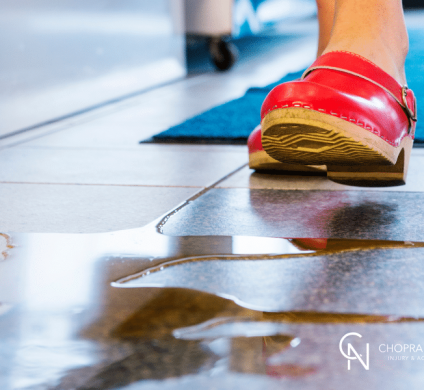 a woman about to slip and fall in a store